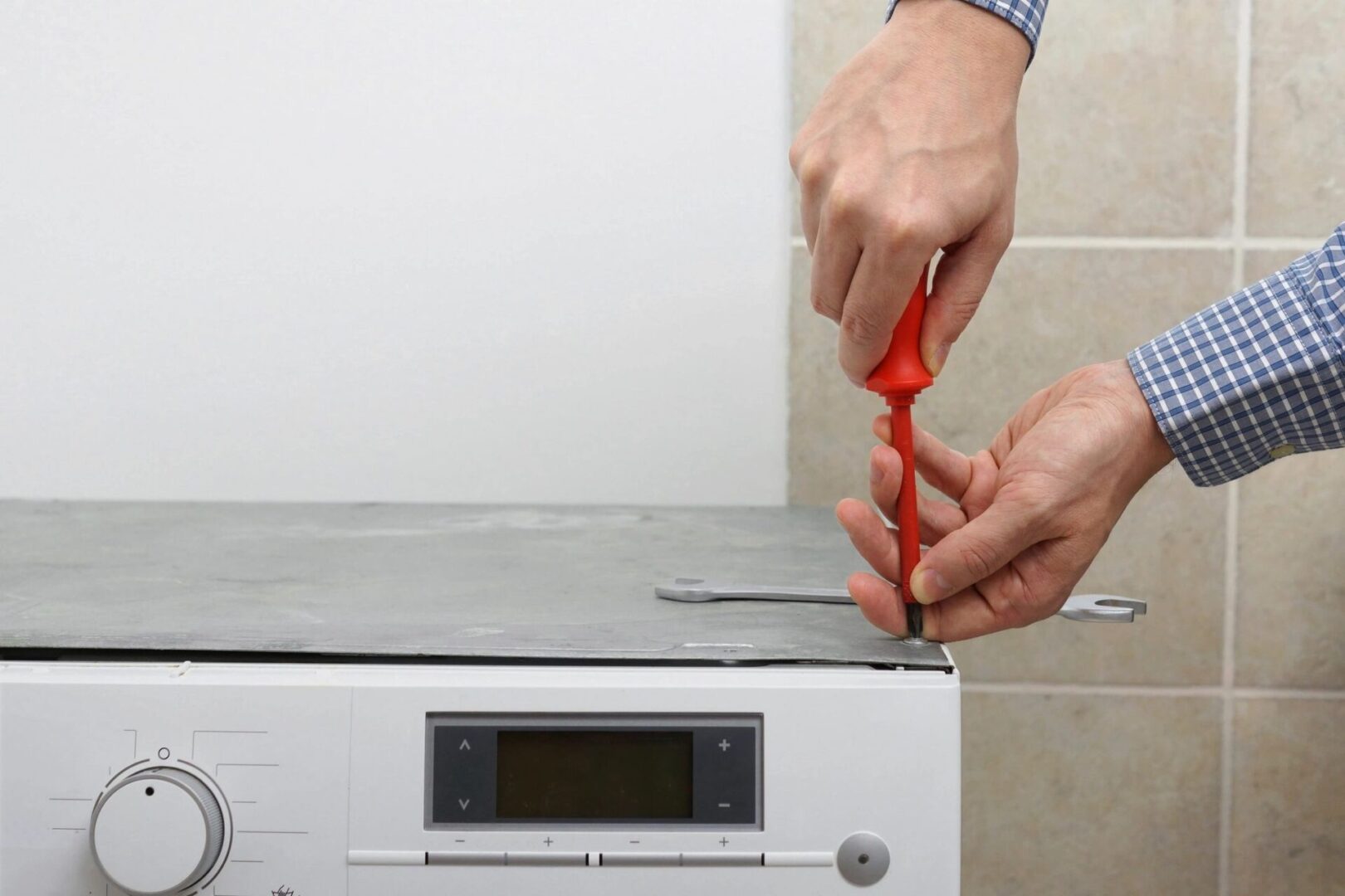 A person is cutting paper with scissors.